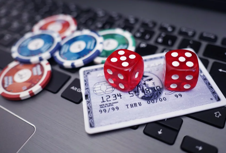 chips and dices placed on top of a keyboard