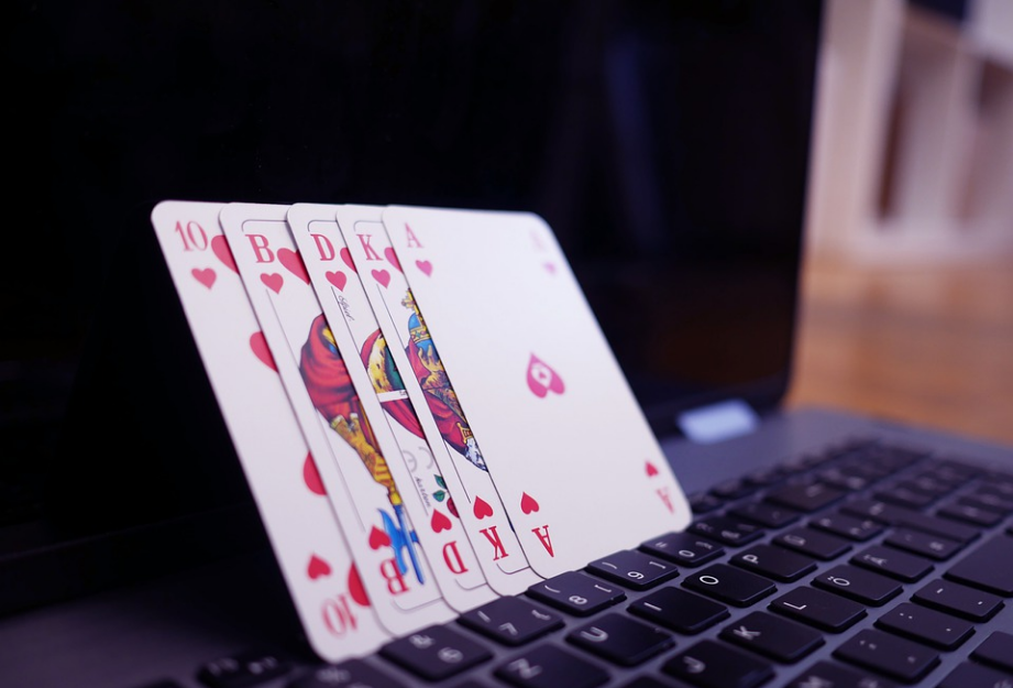cards and laptop on the table